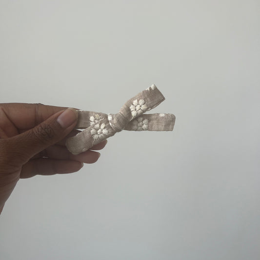 beige embroidered | skinny bow