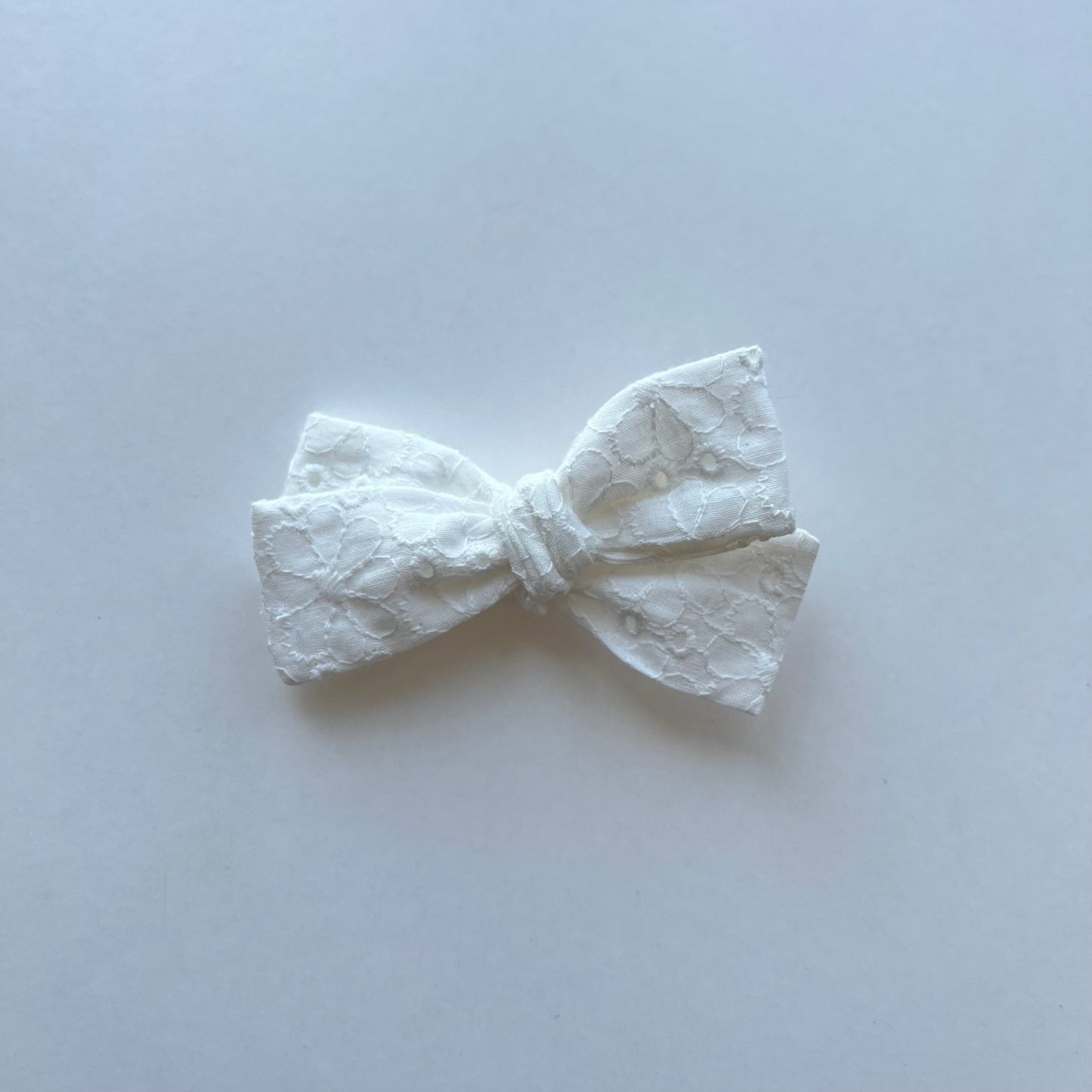 white eyelet | baby bow