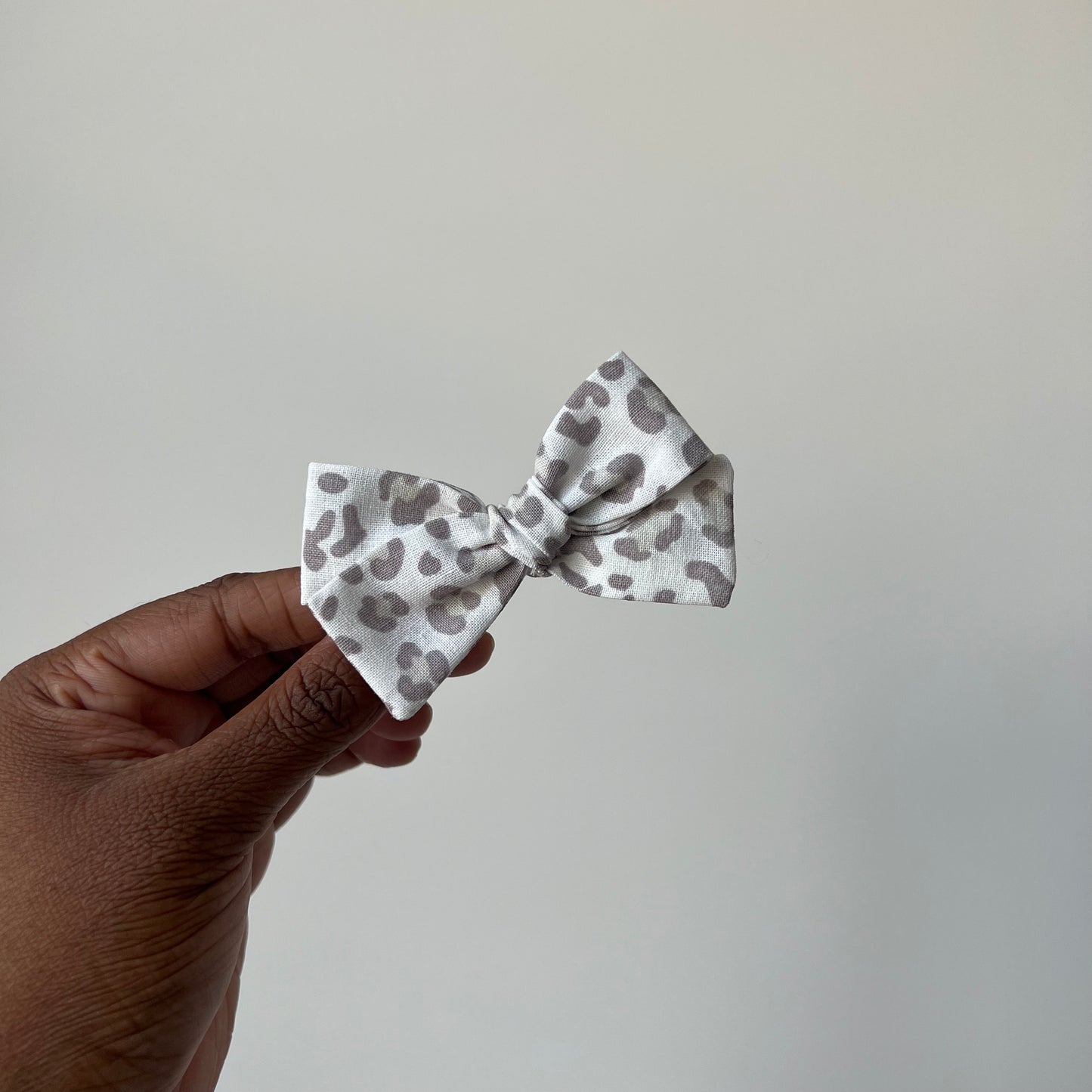 neutral animal print | baby bow